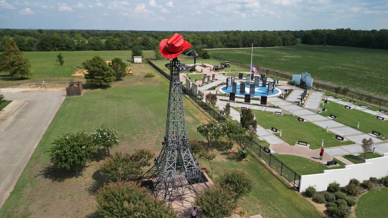 An aerial view of the Eiffel Tower, topped by a cowboy hat, in Paris, Texas