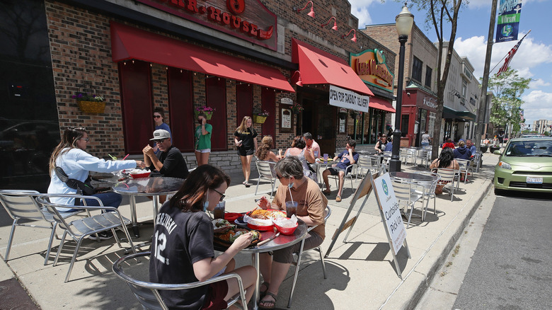 People dining outside of a restaurant in La Grange, IL
