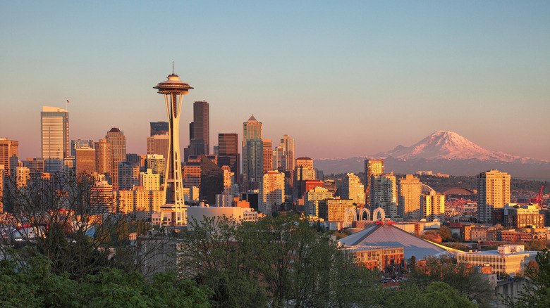 Mount Rainier rises behind the city of Seatlle, WA