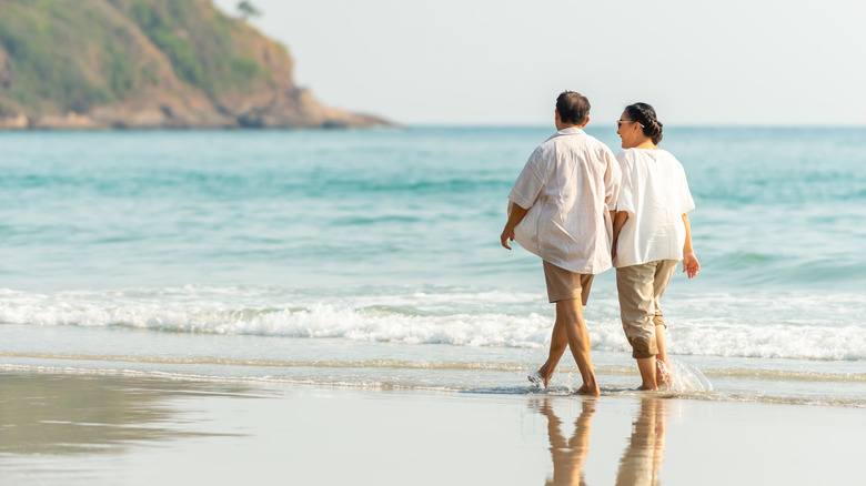 Retired couple on a beach