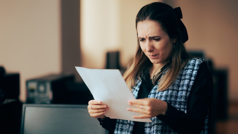Woman reading a contract