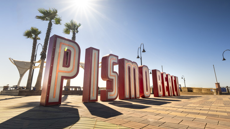 The famous Pismo Beach sign on the coast of Pismo Beach itself