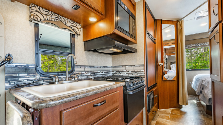 RV kitchen with a decorative backsplash