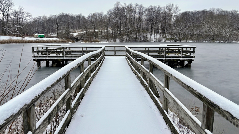 Photo of the dock at Delaware Lake in Indiana's Fort Harrison State Park after a winter snow storm