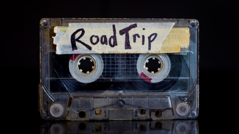 A cassette tape with "Road Trip" written on it
