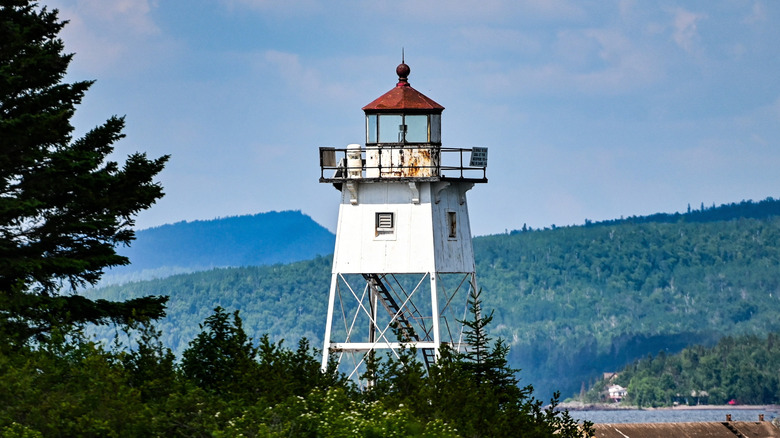 A lighthouse in a harbor in Grand Marais, Minnesota