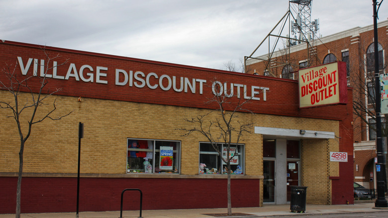 The exterior of Village Discount Outlet, a small, popular thrift outlet in Chicago