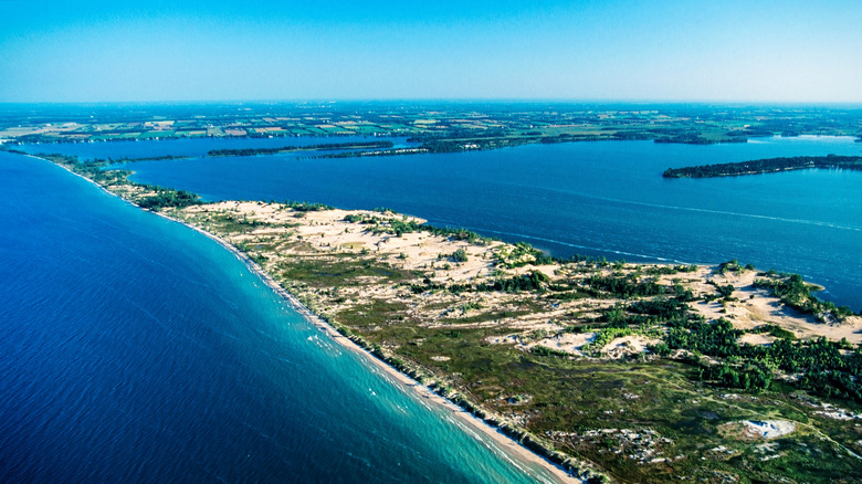 Aerial view of long peninsula with turquoise water