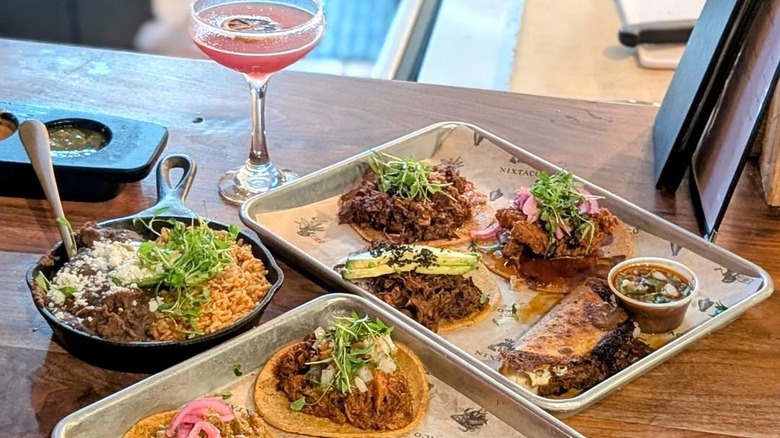A selection of tacos, along with a margarita, a Nixtacos, Sacramento, California