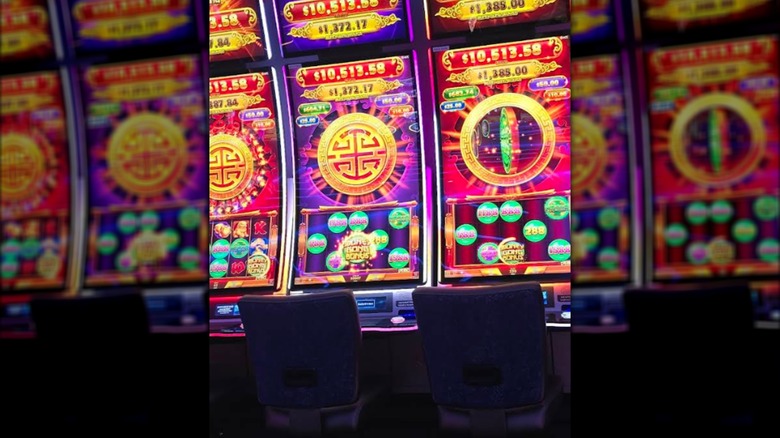 A row of slot machines inside Coweta Casino Hotel