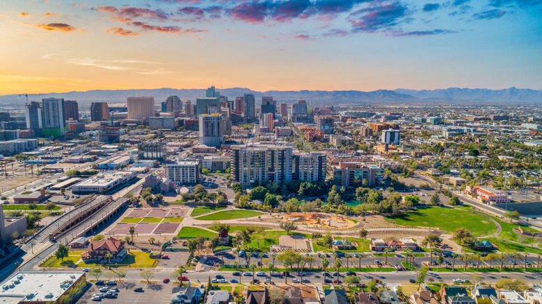 Buildings and parks across the Phoenix, Arizona, skyline at sunset