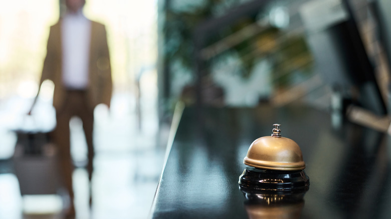 hotel check in desk concierge bell