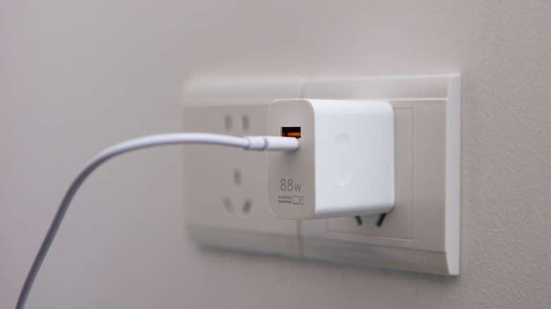 Phone charger plugged into the wall