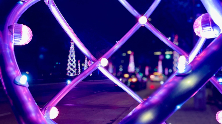 Closeup of LED Christmas tree in Houston with street in background
