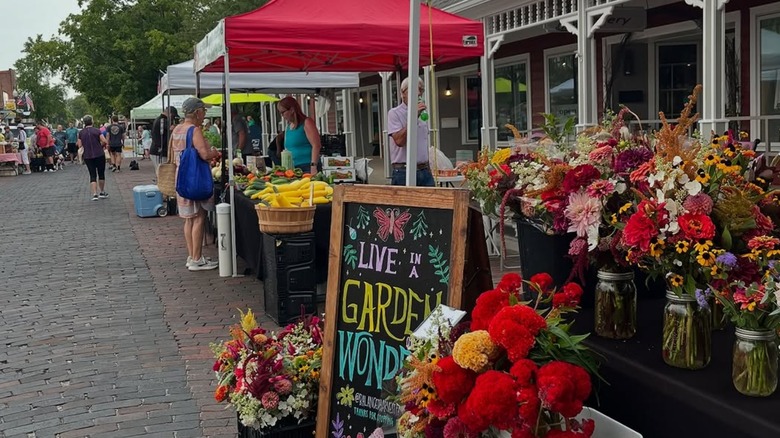 Stands and flowers at the Zionsville Farmers Market