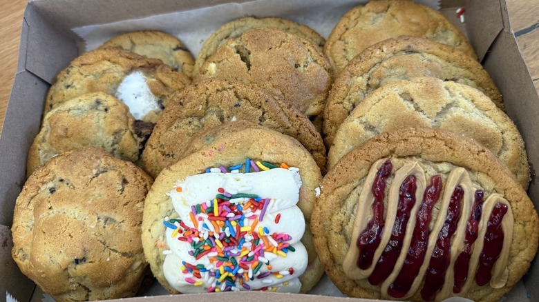 Munster Cravings' cookie varieties in a box, both frosted and unfrosted