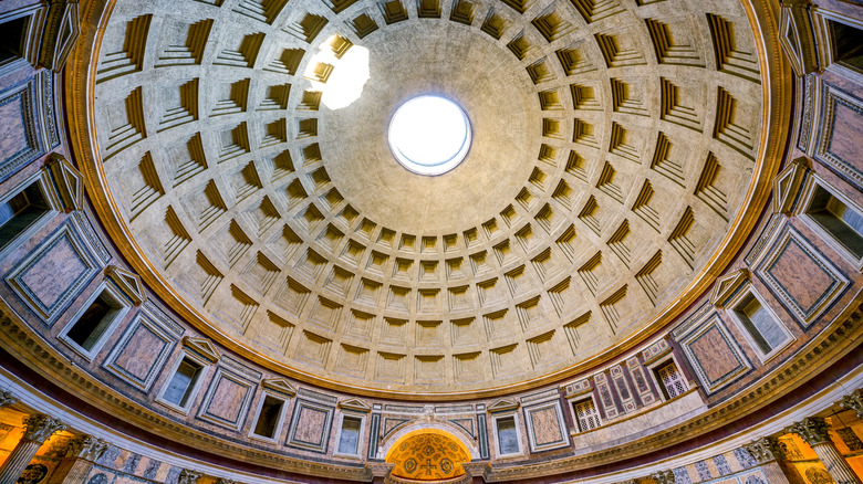 View of domed ceiling of Pantheon with round open window in the center