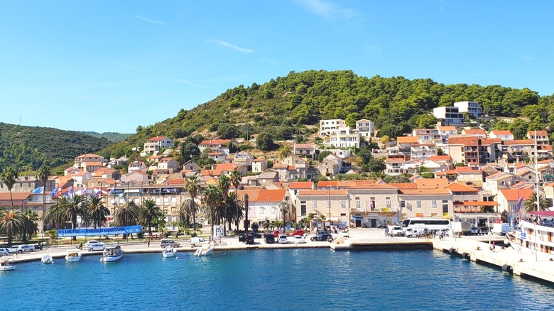 European island town among green hills on the water