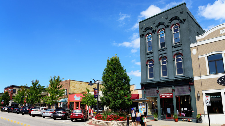 Quaint old buildings form one side of the street in downtown Grand Haven.