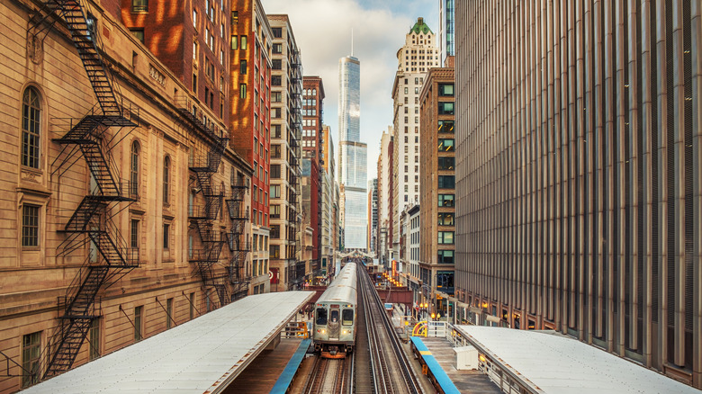 An aerial view of an L train in downtown Chicago