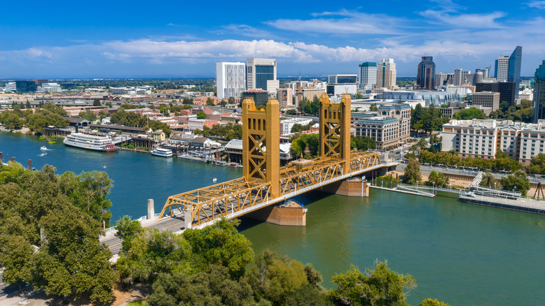 aerial view of skyline and bridge over Sacramento River
