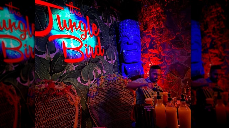 bartender pouring drinks at tiki-inspired The Jungle Bird in Sacramento