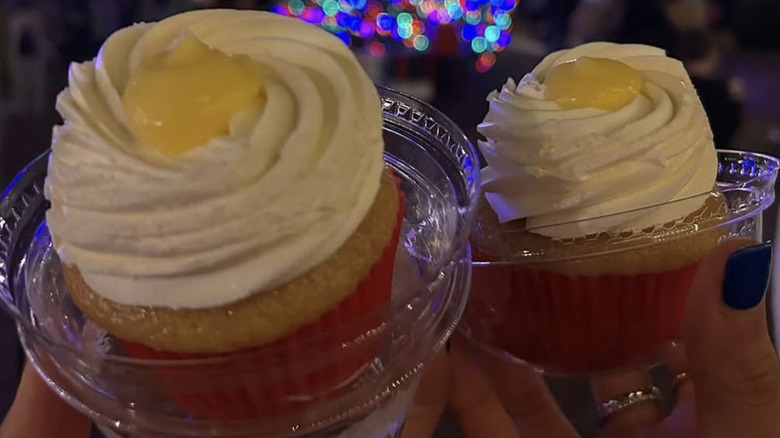 Two Lemon Cream cupcakes in plastic lids
