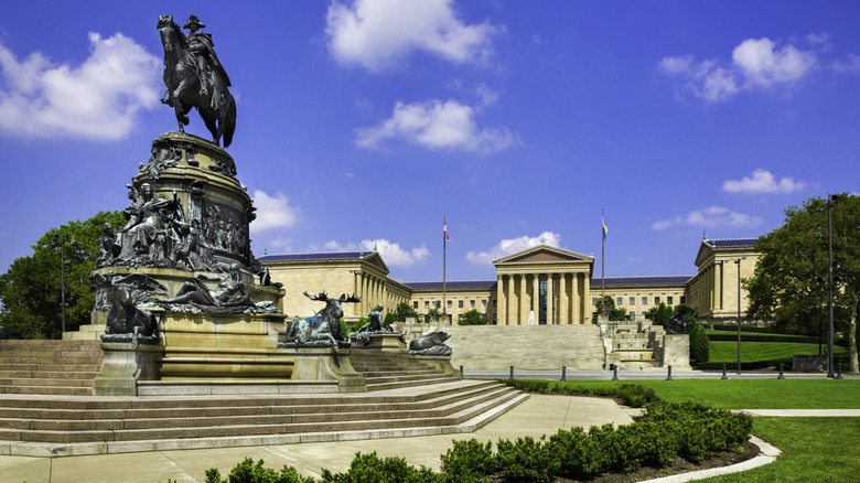 A statue and steps in front of the Philadelphia Museum of Art