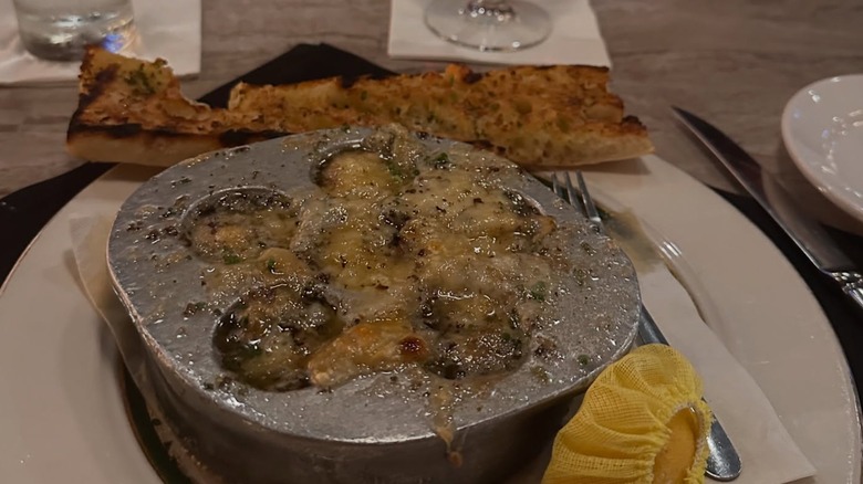 closeup of sesame tuna dish with risotto and haricots verts