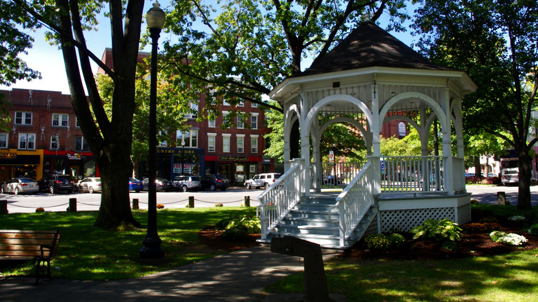 Central Square in Keene, New Hampshire, with white gazebo under shady trees