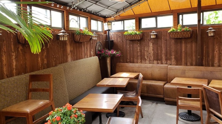 Seating in an enclosed patio at Hart Bar in Brooklyn