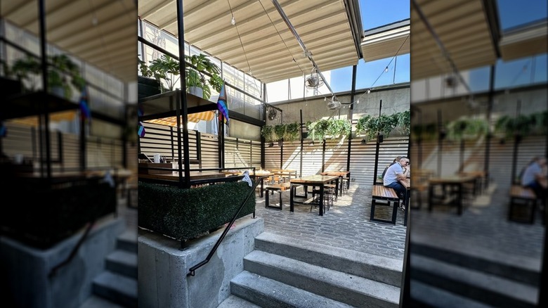 Patio with sunlight filtering in at The Bonnie in Astoria, Queens