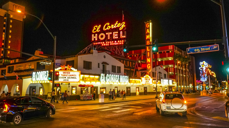 Outside view of the El Cortez casino hotel with neon signage and people outside