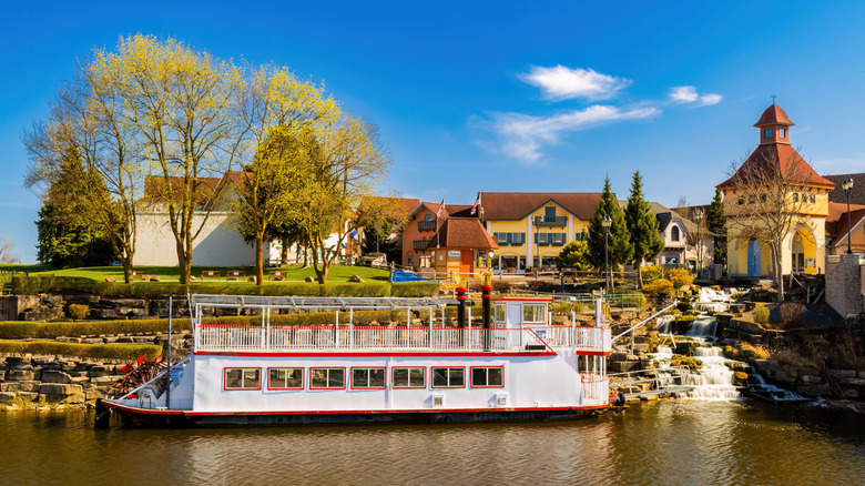 The Bavarian Belle vintage riverboat docked in downtown Frankenmuth, Michigan near the river and surrounded by Bavarian-style charm
