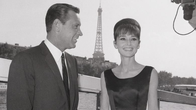 Audrey Hepburn and William Holden in Paris with Eiffel Tower in background