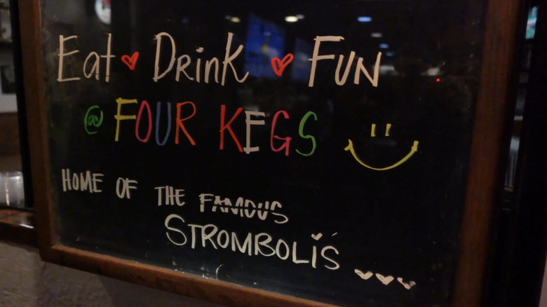 A handwritten sign at Four Kegs Sports Pub in Las Vegas