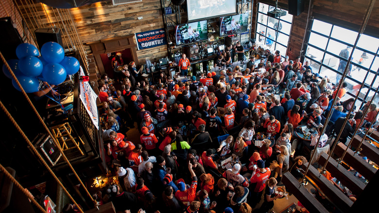 A huge crowd of Denver Broncos fans gathered inside the ViewHouse bar watching the game.