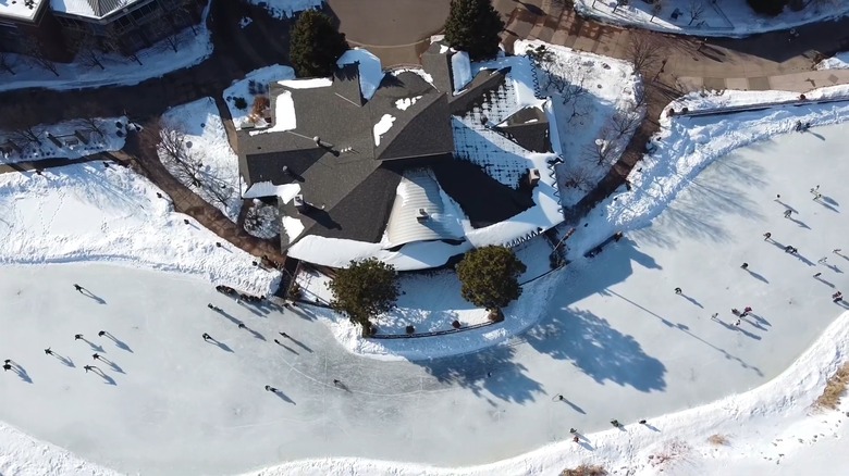 Aerial view of ice skaters at Centennial Lakes Park