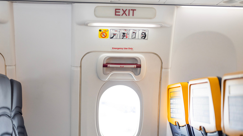 A plane cabin exit door