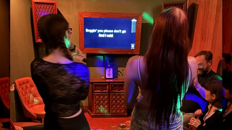 Karaoke singers in the '70s room at Baby Ketten Klub