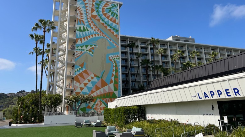 Town and Country Resort tall building with colorful decoration and The Lapper sign