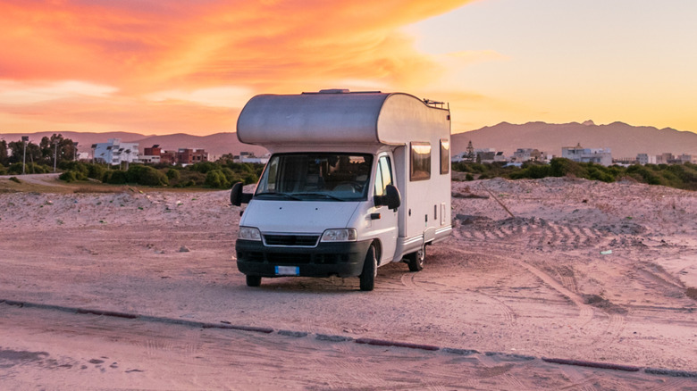 Person holding a container of talcum powder