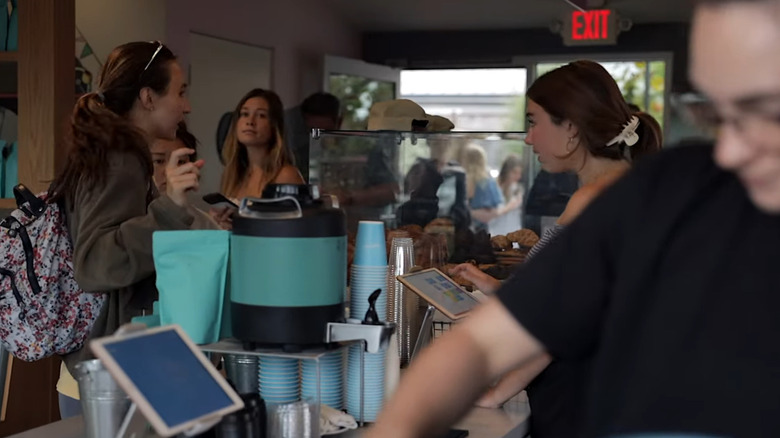 Customers being served at Cat & Cloud coffee