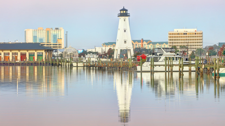 A picture of a lighthouse over the water at dusk in Gulfport Mississippi