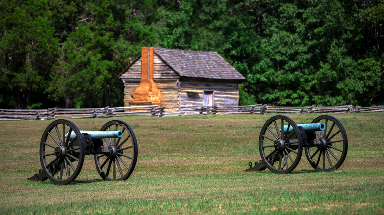 Cannons and historic cabin at Shiloh National Military Park, Tennessee