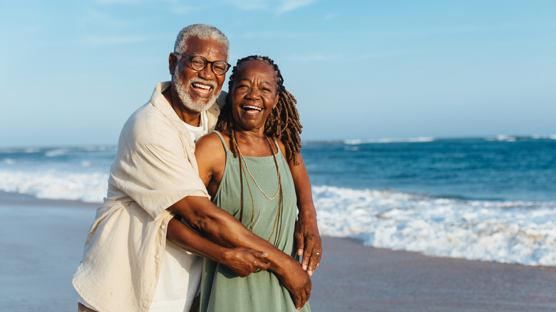 Older couple sharing a moment on the beach