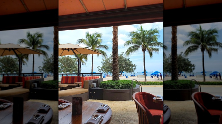 Couches at the outdoor patio of S3 (Sun Surf Sand) with Fort Lauderdale beach views