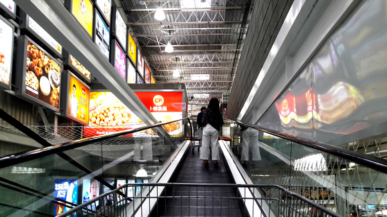 Costco wholesale warehouse shopping store main entrance escalator in Kaohsiung, Taiwan