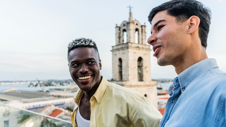 Men talk near church in Caribbean