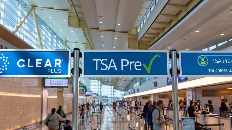 Passengers line up for TSA PreCheck in an airport